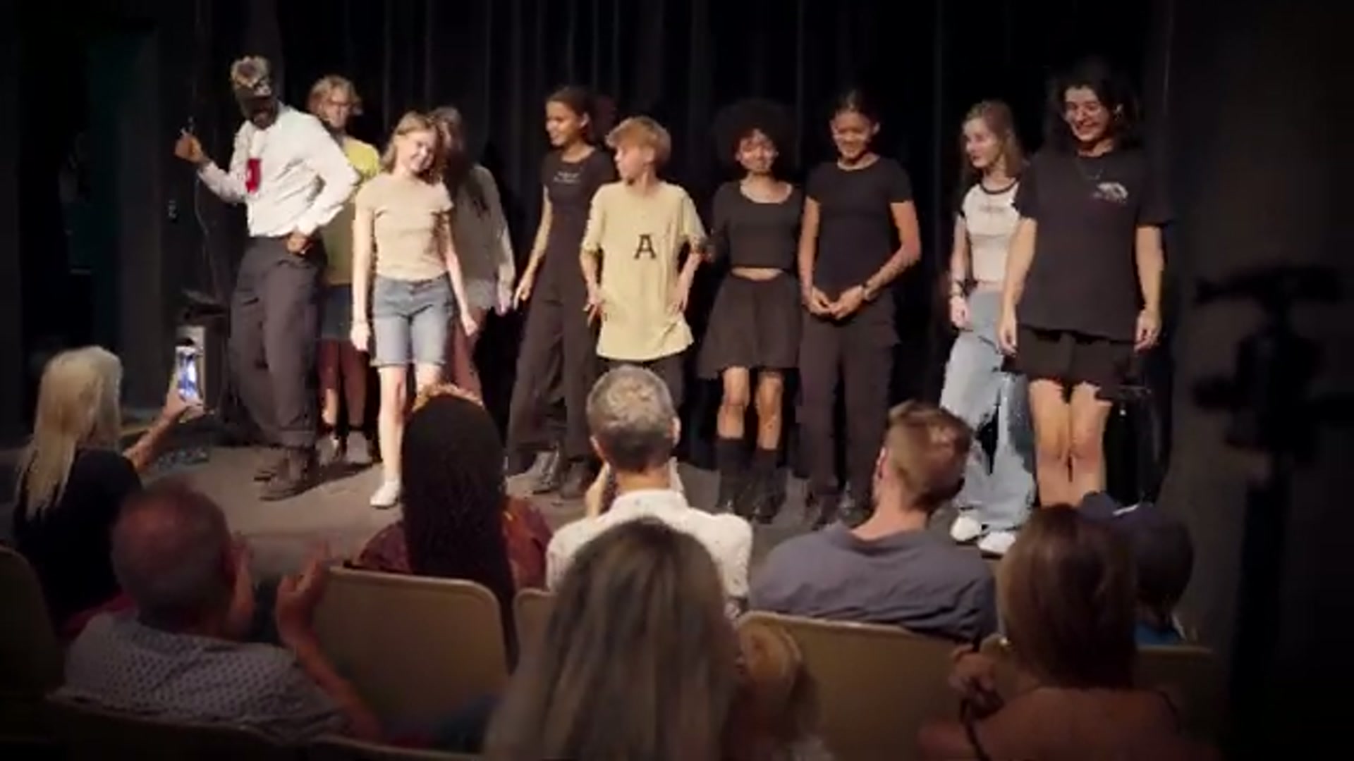 Matista cohort on stage at curtain call